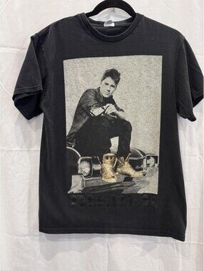 Vintage 2012 Justin Bieber official merchandise graphic tee is a black t-shirt